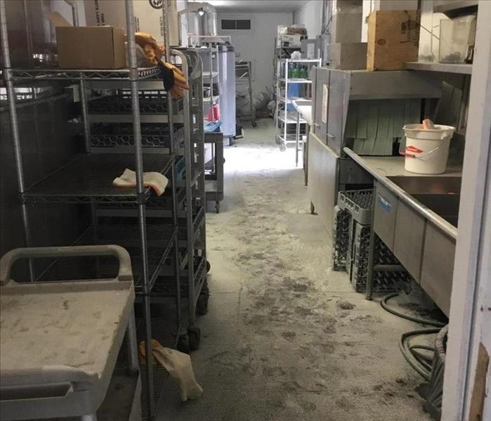 back room of building with racks - dirty